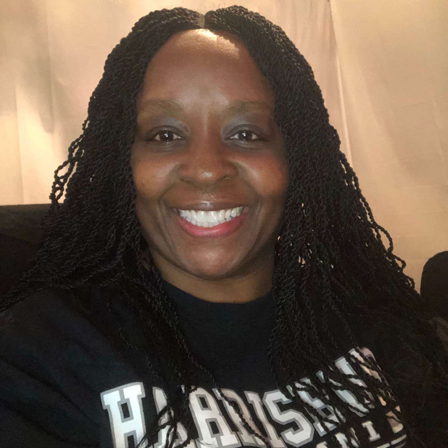 Ms. Henderson ,teaching online interactive classes for kids on